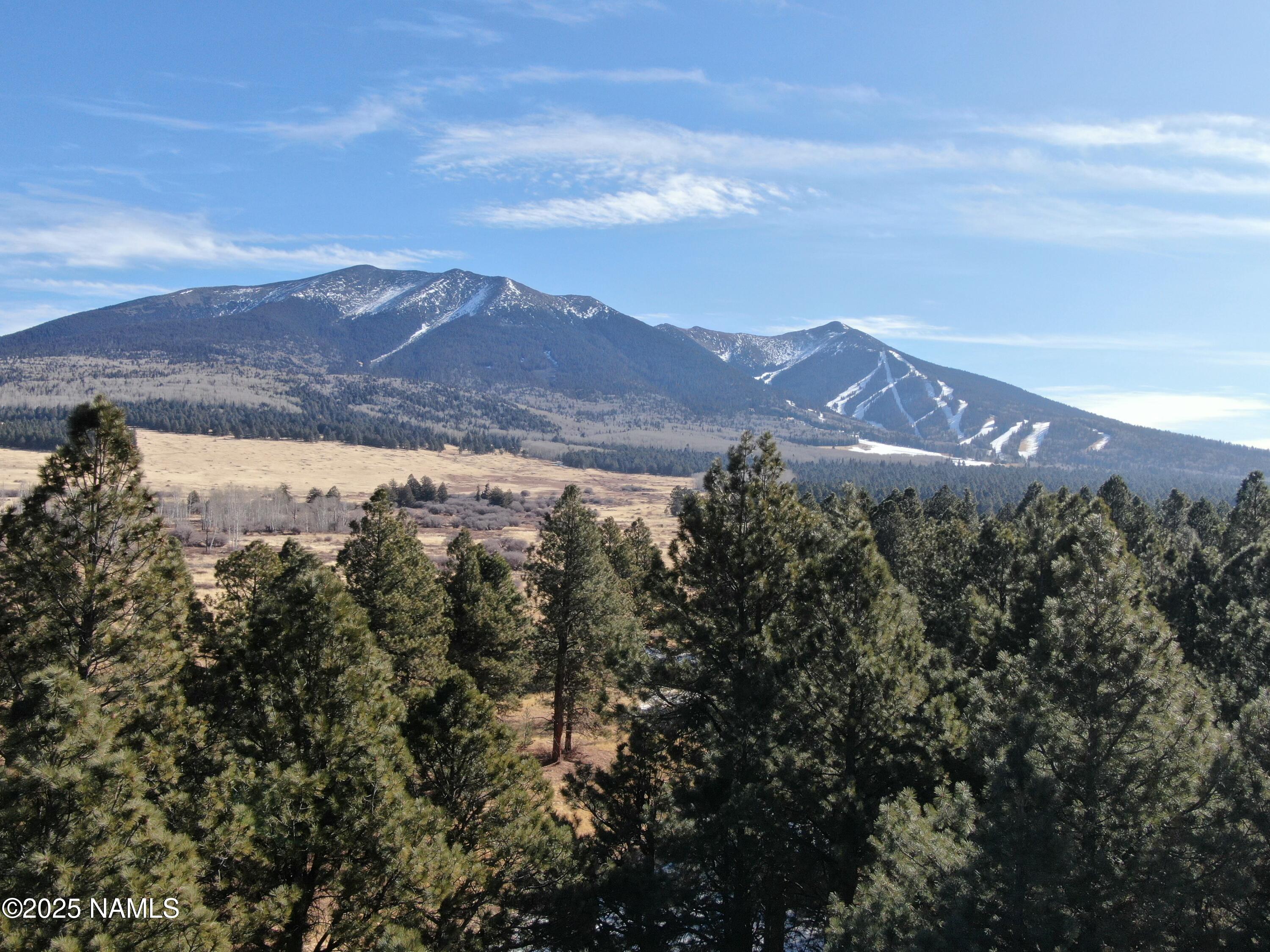 3 Hart Prairie Road Flagstaff, AZ 86001 - Photo 25 of 30 a view of lake with mountain