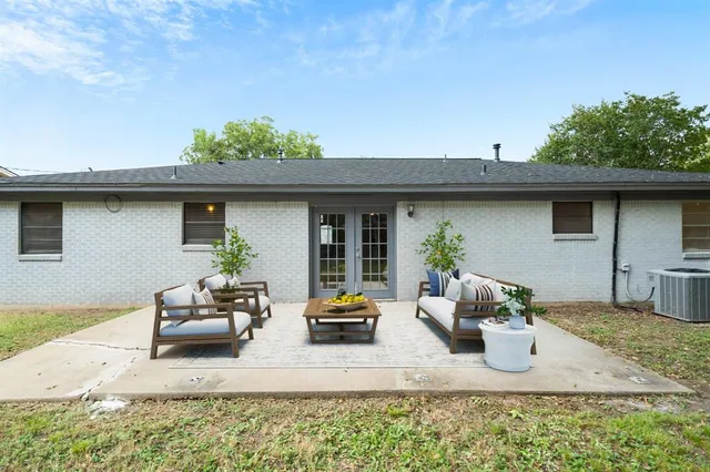 a front view of a house with chair