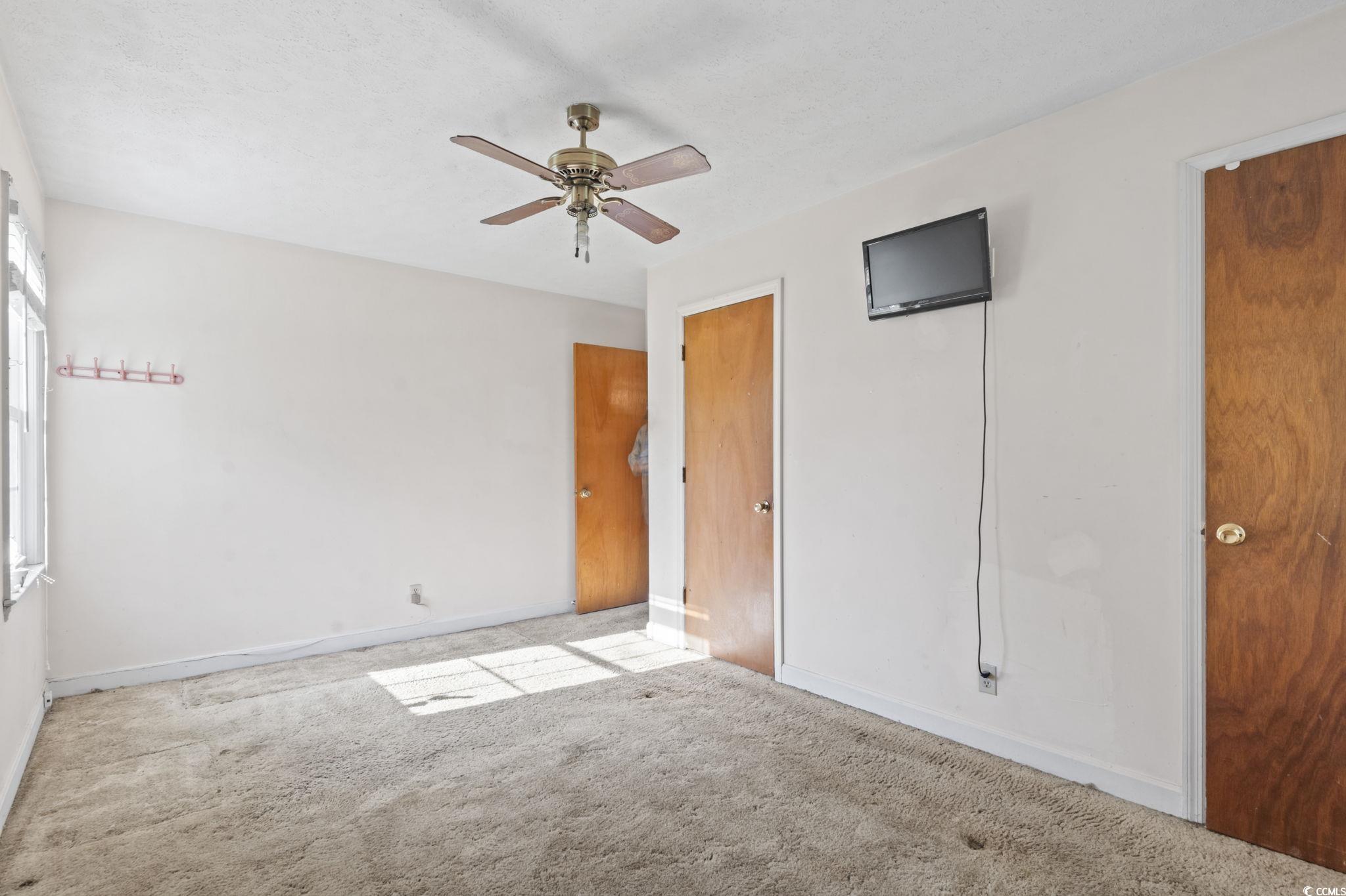 6971 Alfred Road Aynor, SC 29511 - Photo 24 of 37 Unfurnished bedroom with carpet and a ceiling fan