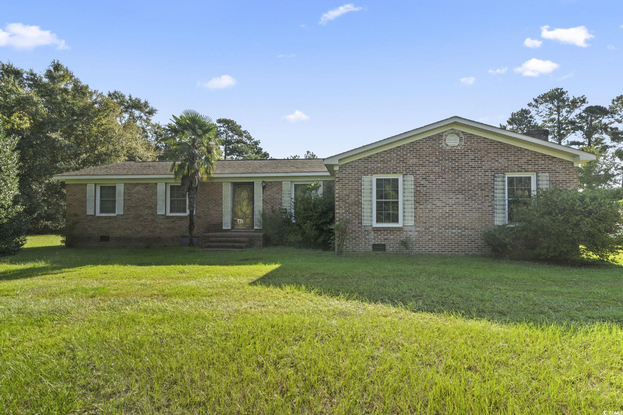 6971 Alfred Road Aynor, SC 29511 - Photo 3 of 37 Ranch-style home with brick siding, crawl space, and a front lawn