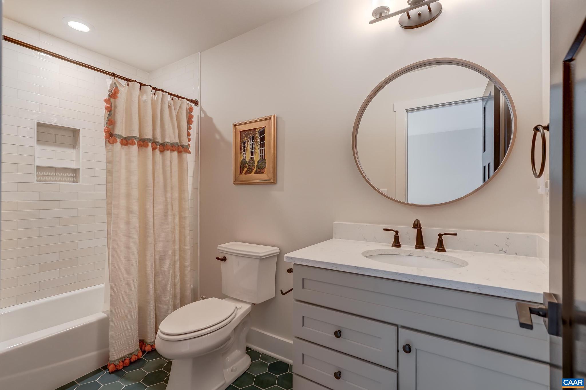 3327 Rowcross Street Crozet, VA 22932 - Photo 37 of 63 a bathroom with a sink toilet and shower