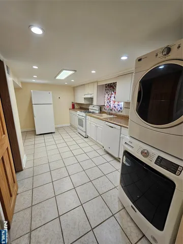 a view of a room with white walls