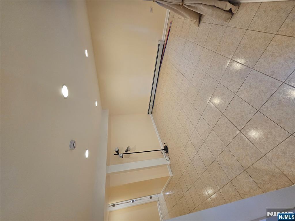 122 Eckel Road Little Ferry, NJ 07643 - Photo 15 of 16 a view of a room with white walls