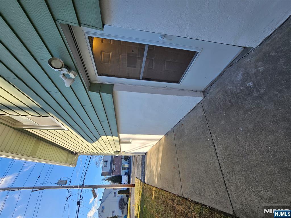 122 Eckel Road Little Ferry, NJ 07643 - Photo 16 of 16 a view of outdoor space and porch