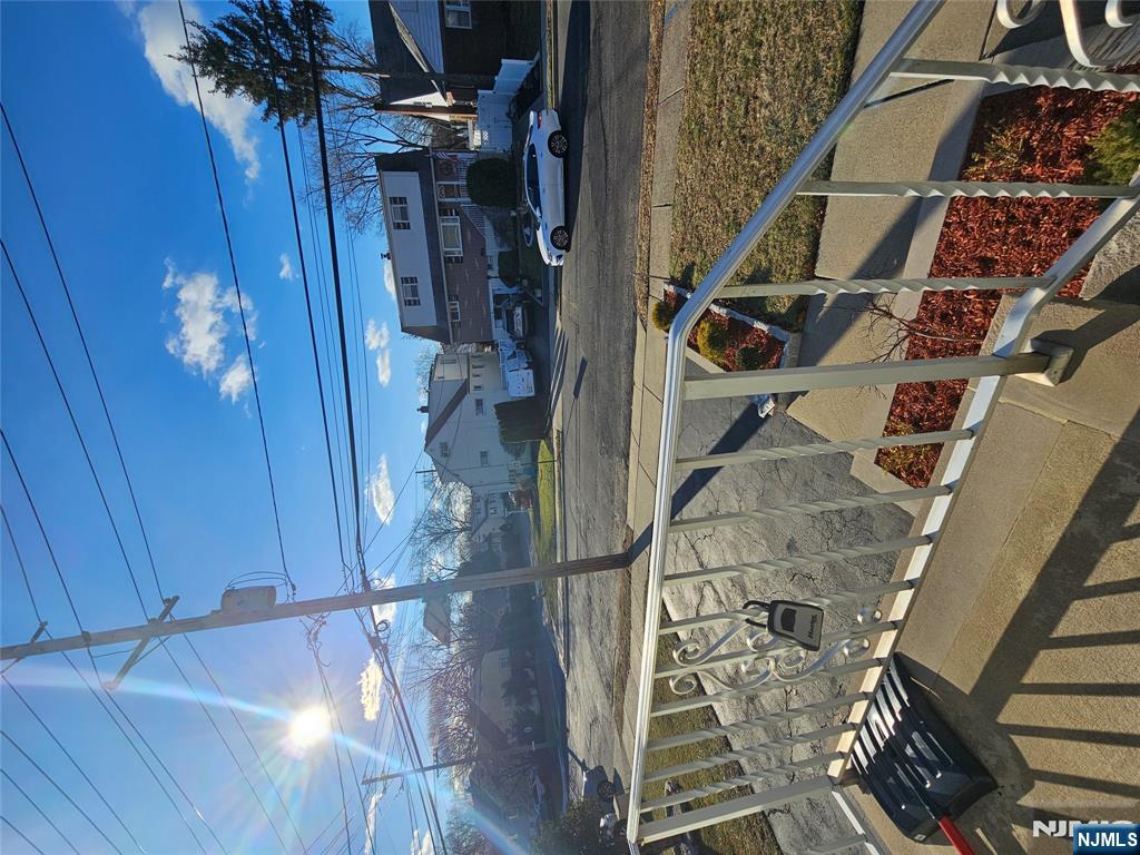 122 Eckel Road Little Ferry, NJ 07643 - Photo 2 of 16 a view of a balcony with chairs