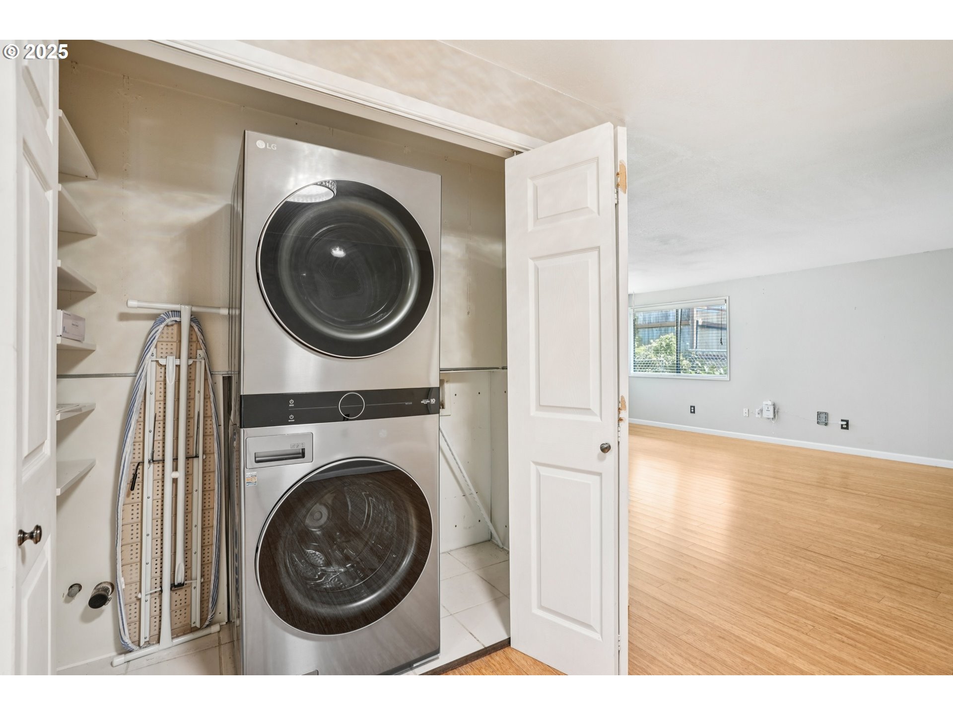 9281 Southwest Boones Ferry Road Portland, OR 97219 - Photo 16 of 27 a view of a hallway with washer and dryer