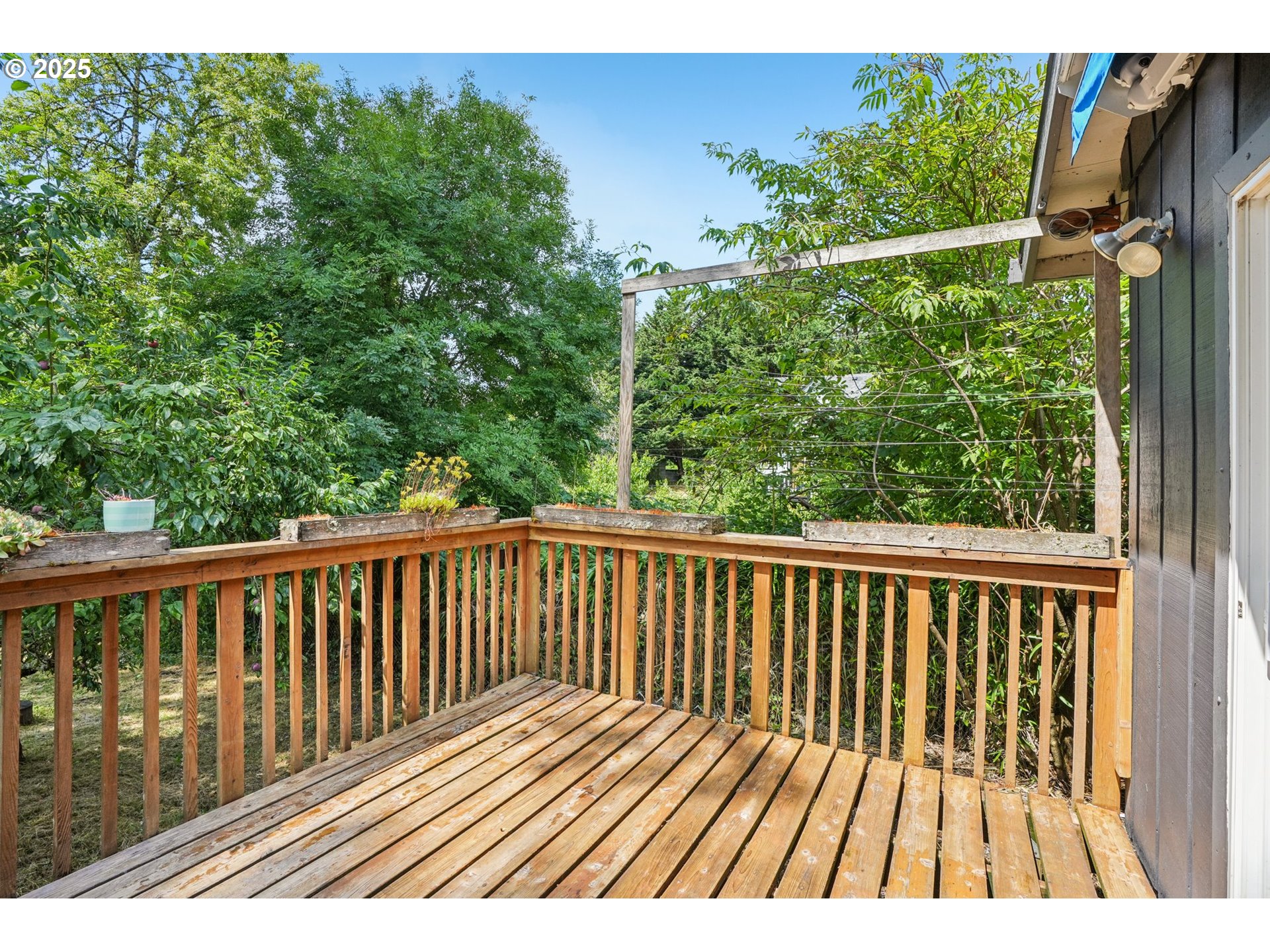 9281 Southwest Boones Ferry Road Portland, OR 97219 - Photo 18 of 27 a view of balcony with wooden floor