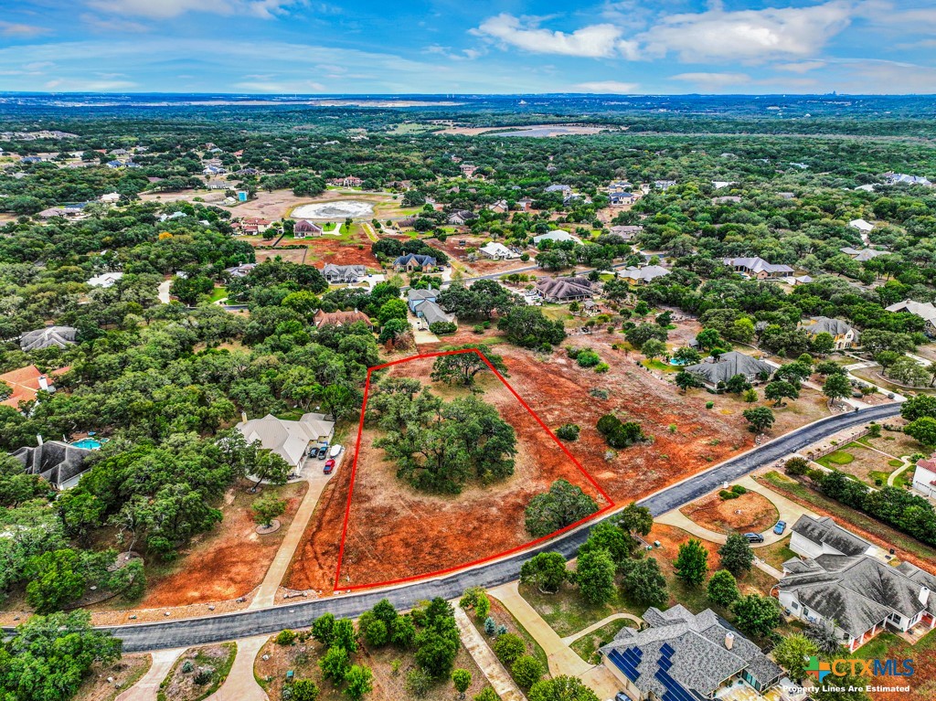27215 Park Loop Road New Braunfels, TX 78132 - Photo 12 of 32 an aerial view of residential houses with outdoor space