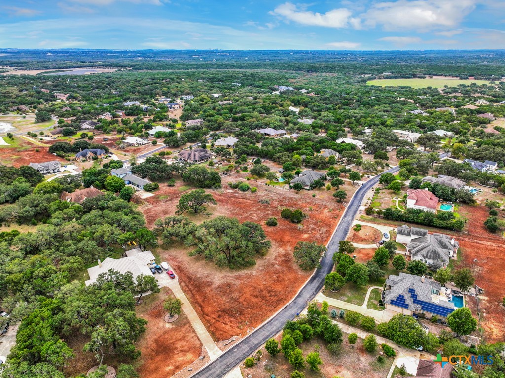 27215 Park Loop Road New Braunfels, TX 78132 - Photo 14 of 32 an aerial view of residential houses with outdoor space