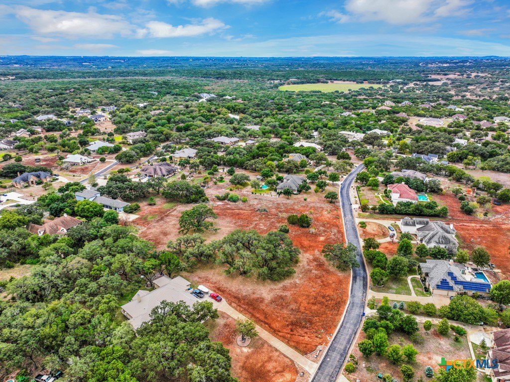27215 Park Loop Road New Braunfels, TX 78132 - Photo 15 of 32 an aerial view of residential houses with outdoor space and trees