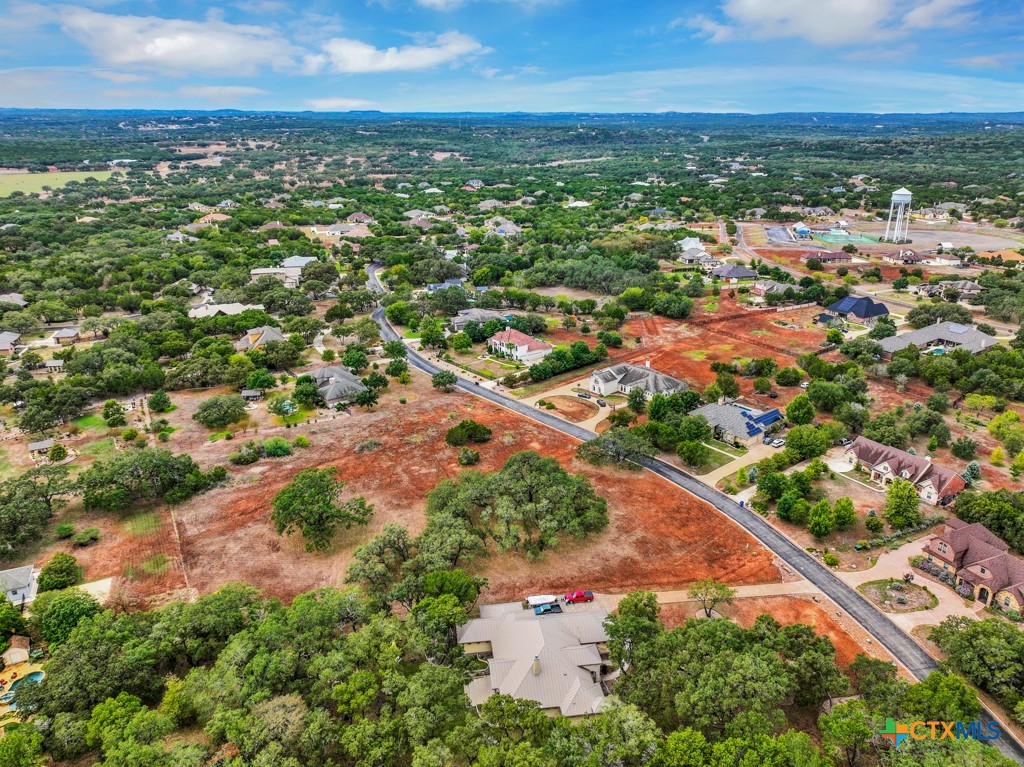 27215 Park Loop Road New Braunfels, TX 78132 - Photo 17 of 32 an aerial view of residential houses with outdoor space and trees