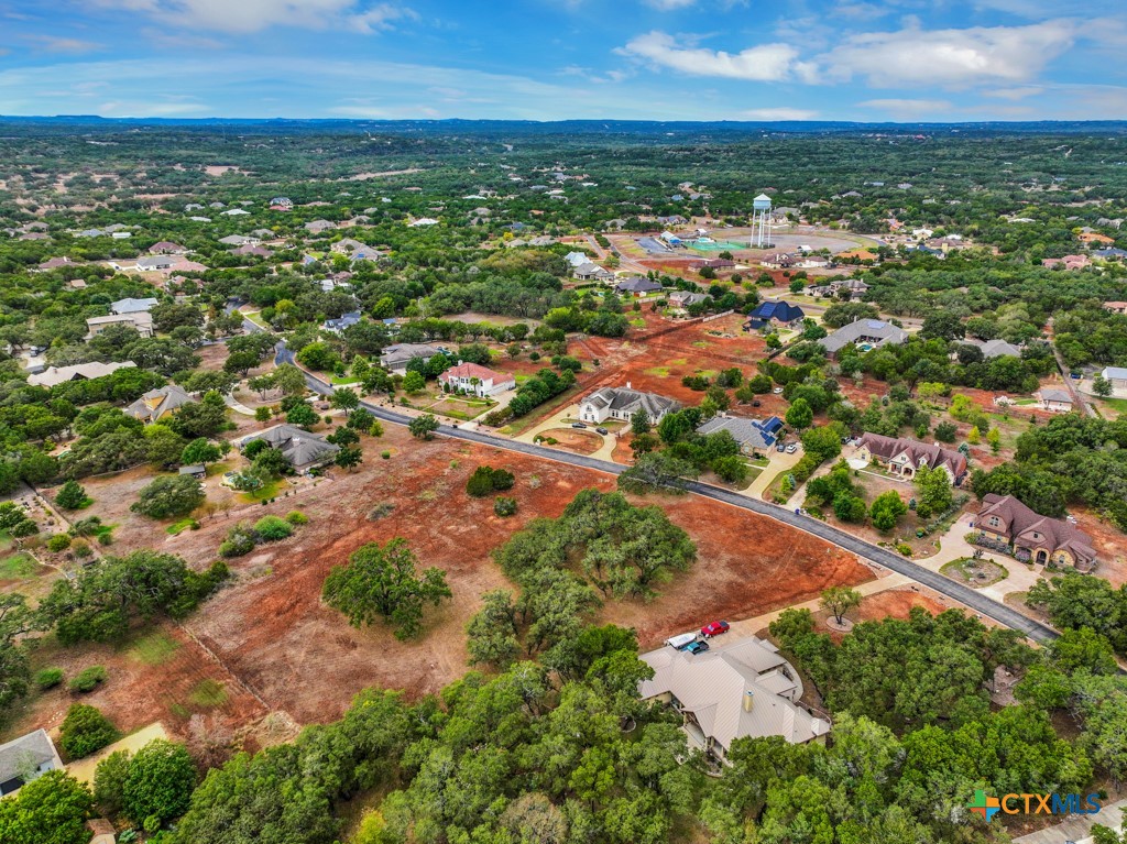 27215 Park Loop Road New Braunfels, TX 78132 - Photo 18 of 32 an aerial view of residential houses with outdoor space