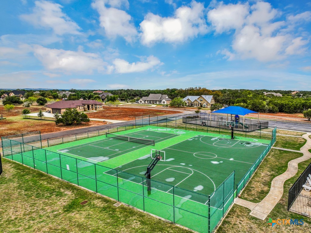 27215 Park Loop Road New Braunfels, TX 78132 - Photo 31 of 32 a view of a field with sitting area