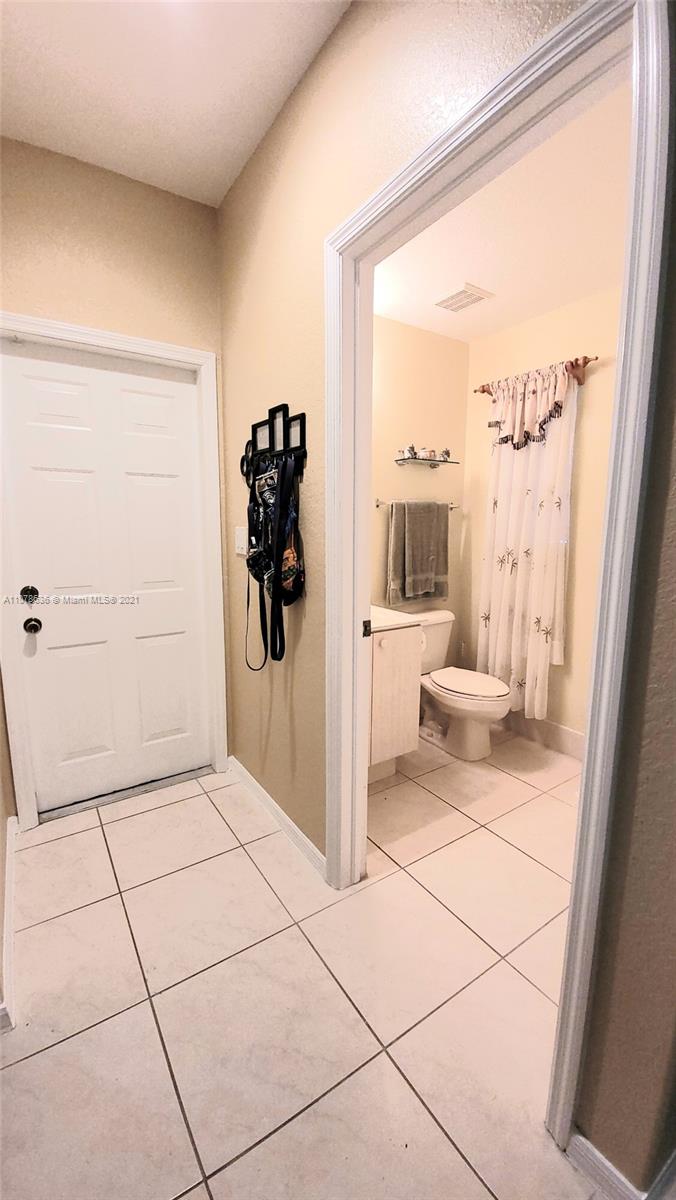 Keys Gate Homestead, FL 33035 - Photo 14 of 26 a view of a bathroom with a shower