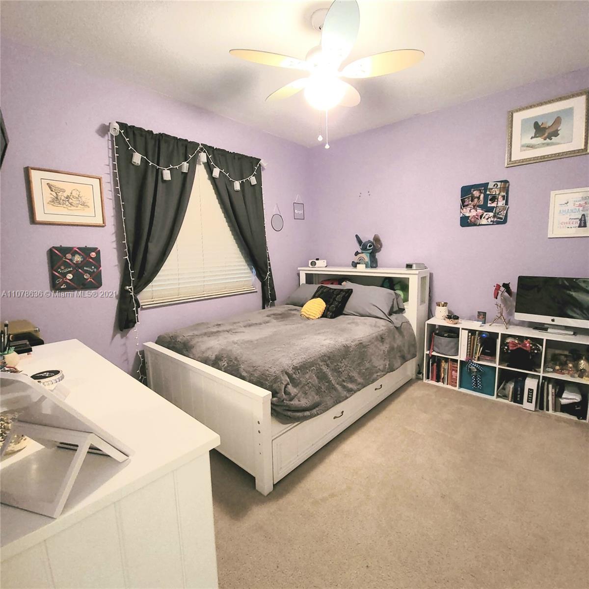 Keys Gate Homestead, FL 33035 - Photo 18 of 26 a bedroom with two beds and painted walls