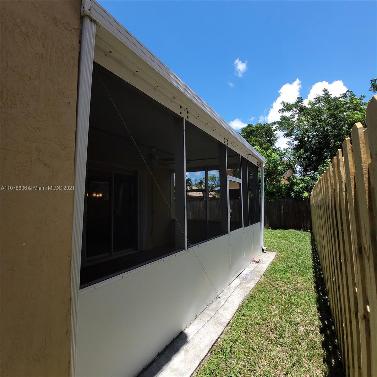 Keys Gate Homestead, FL 33035 - Photo 23 of 26 a view of backyard with potted plants