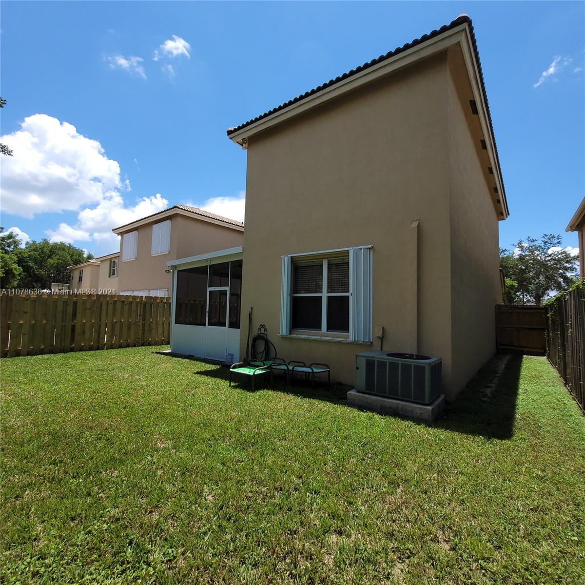 Keys Gate Homestead, FL 33035 - Photo 26 of 26 a view of a house with backyard and garden