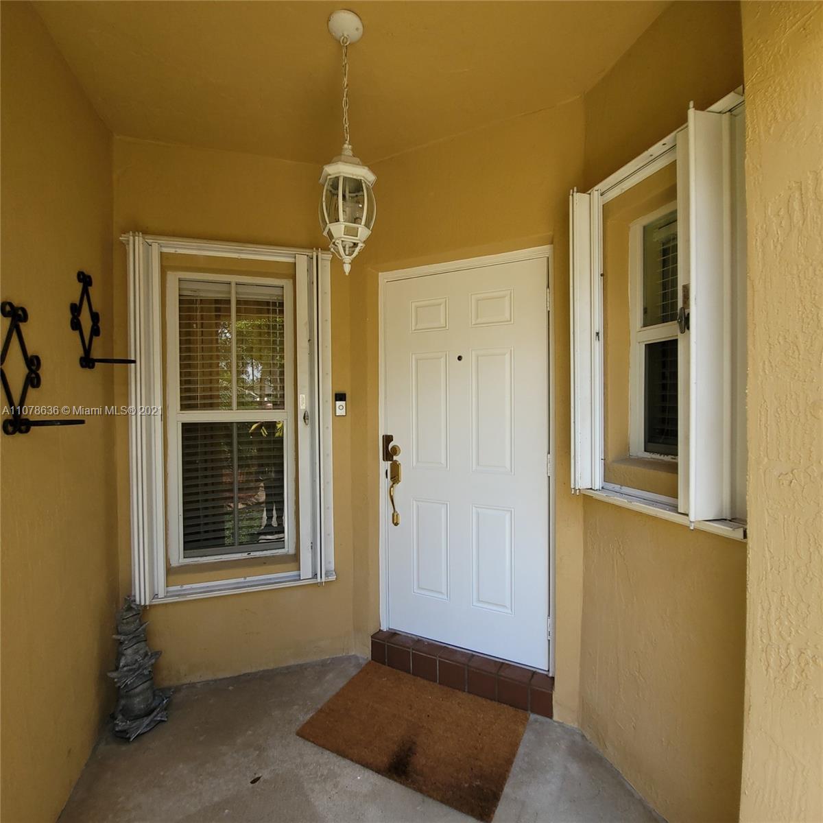 Keys Gate Homestead, FL 33035 - Photo 5 of 26 a view of front door of house