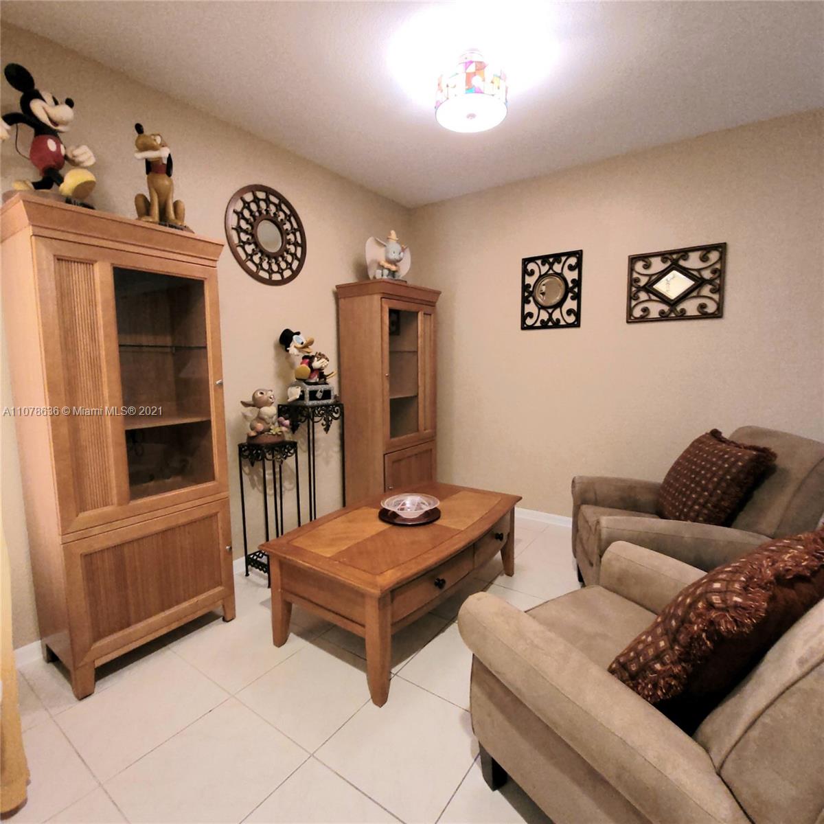 Keys Gate Homestead, FL 33035 - Photo 6 of 26 a living room with furniture and a window