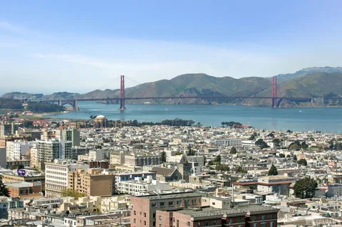 a view of a city with tall buildings in the background