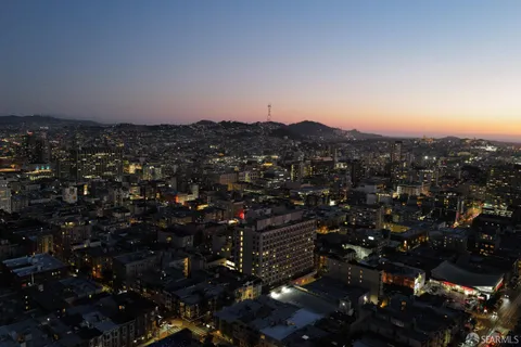 a view of city and a sunset