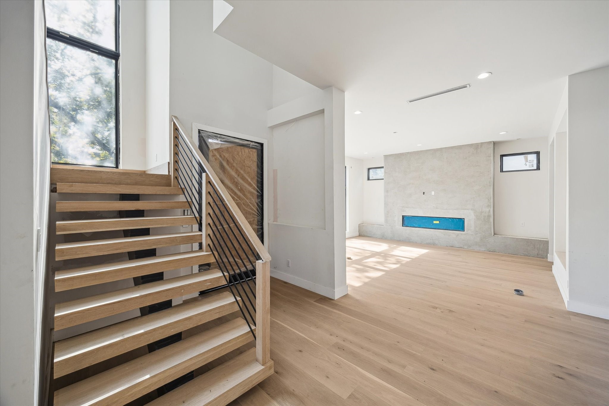 2102 Tangley Street Houston, TX 77005 - Photo 2 of 30 a view of entryway and hall with wooden floor