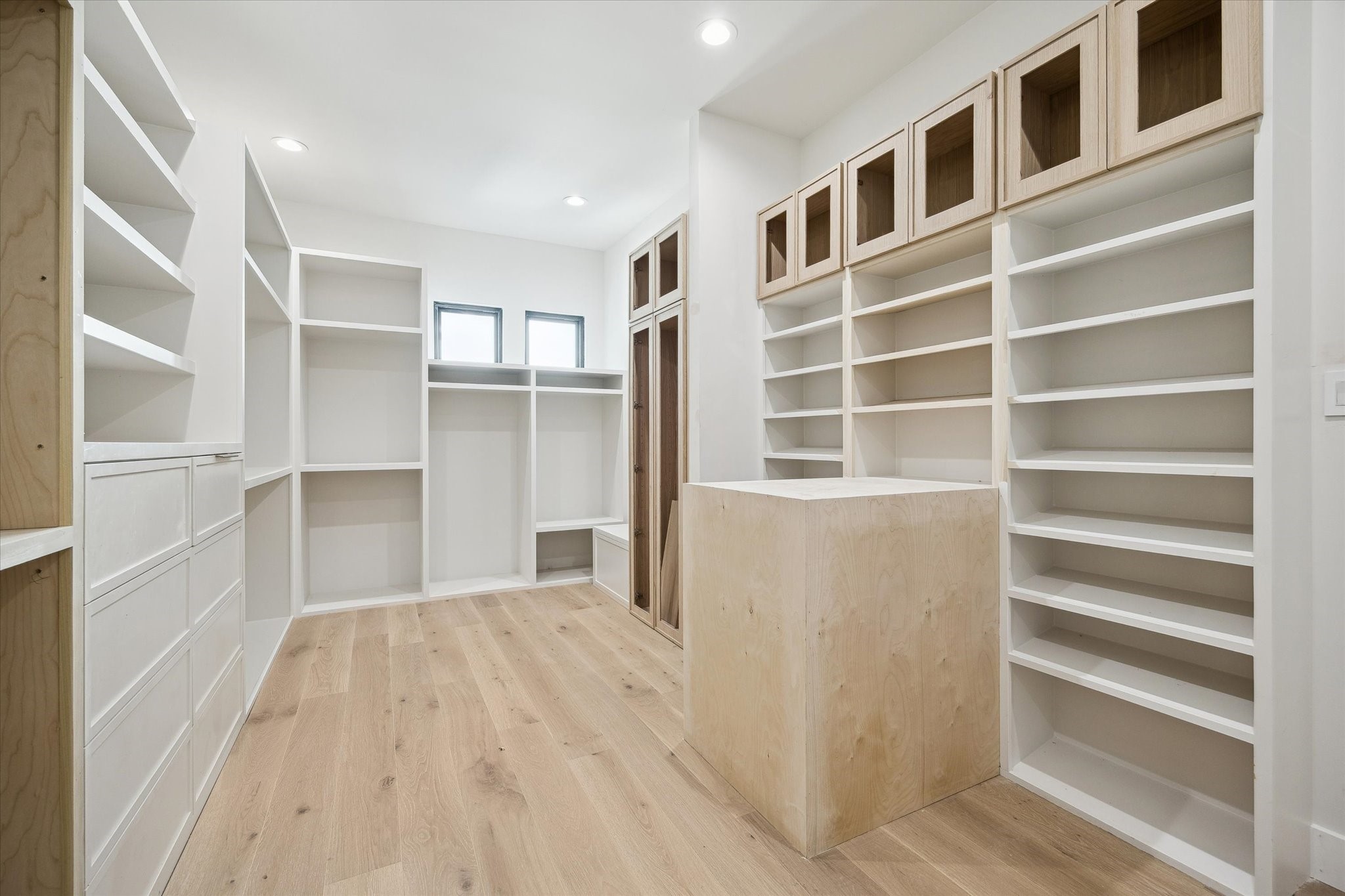 2102 Tangley Street Houston, TX 77005 - Photo 21 of 30 a view of walk in closet with empty racks