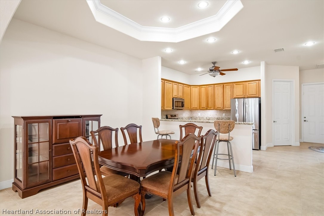 5224 Haw Branch Road Sebring, FL 33875 - Photo 8 of 40 a view of a dining room with furniture