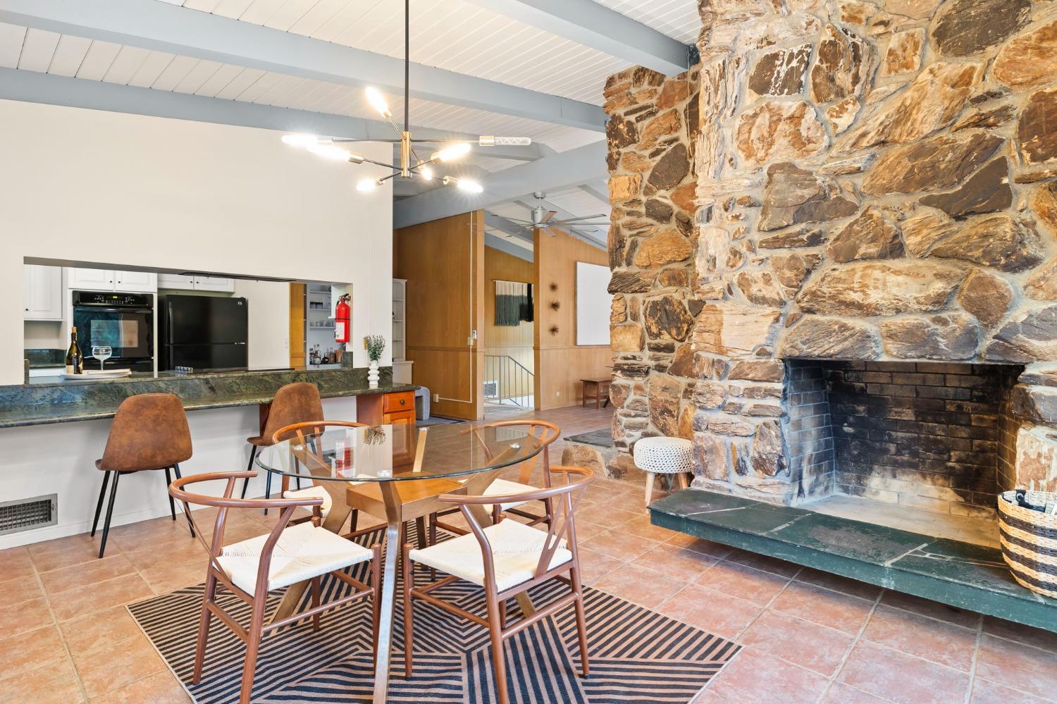 4306 Hendrickson Road Ojai, CA 93023 - Photo 21 of 44 a view of a livingroom with furniture and a fireplace