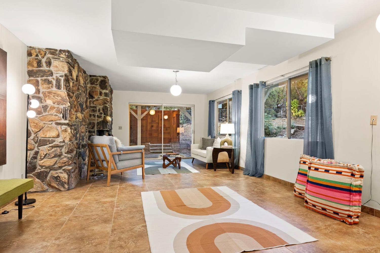 4306 Hendrickson Road Ojai, CA 93023 - Photo 34 of 44 a bedroom with furniture and a large window