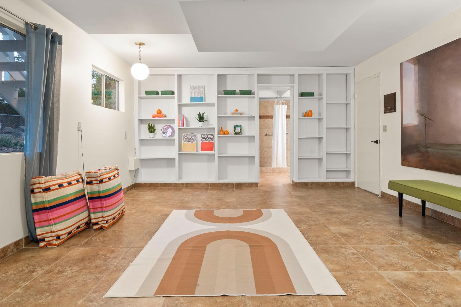 4306 Hendrickson Road Ojai, CA 93023 - Photo 36 of 44 a living room with furniture and white walls