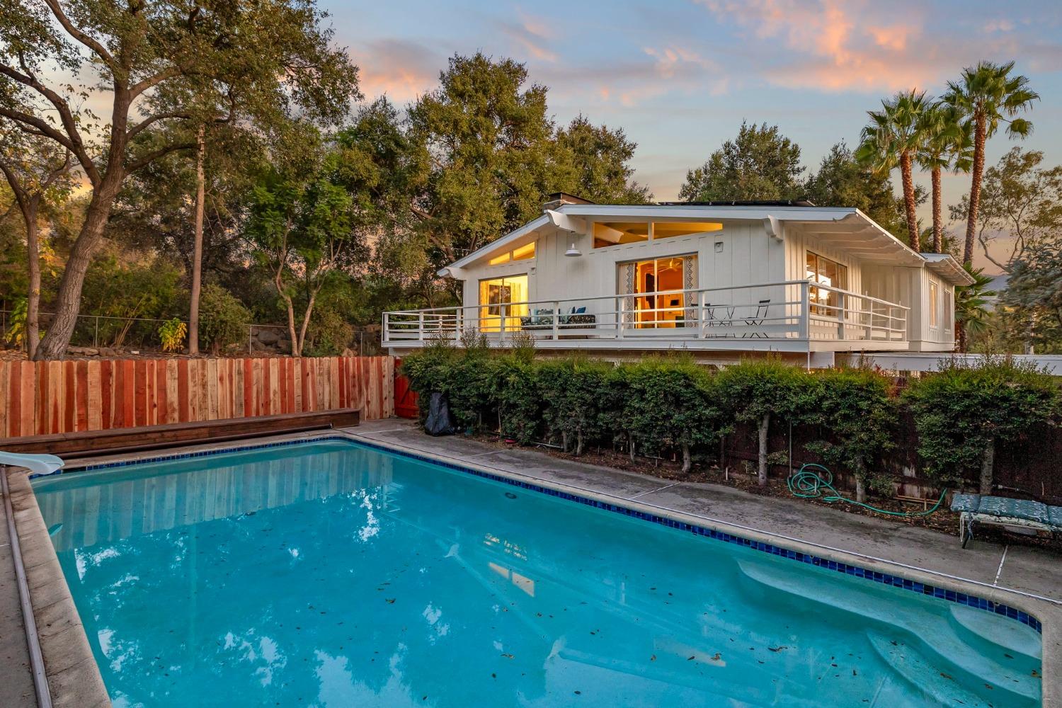 4306 Hendrickson Road Ojai, CA 93023 - Photo 4 of 44 a front view of a house with a yard