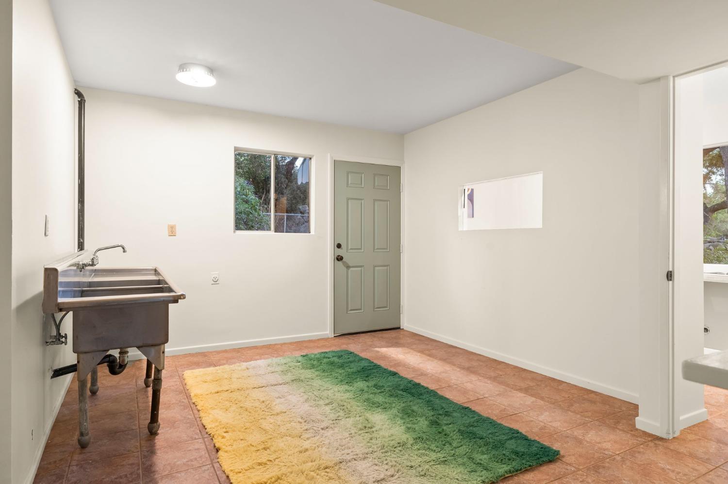 4306 Hendrickson Road Ojai, CA 93023 - Photo 41 of 44 a view of a room with a workspace