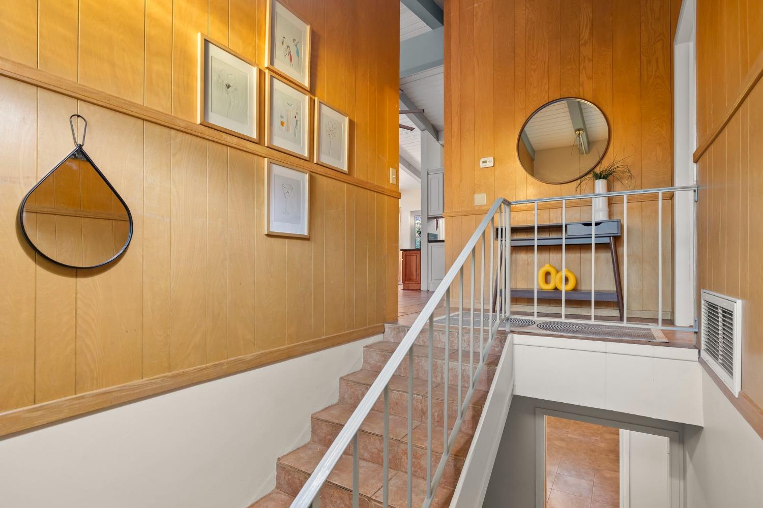 4306 Hendrickson Road Ojai, CA 93023 - Photo 6 of 44 a picture of a brick house with wooden floor and a large window