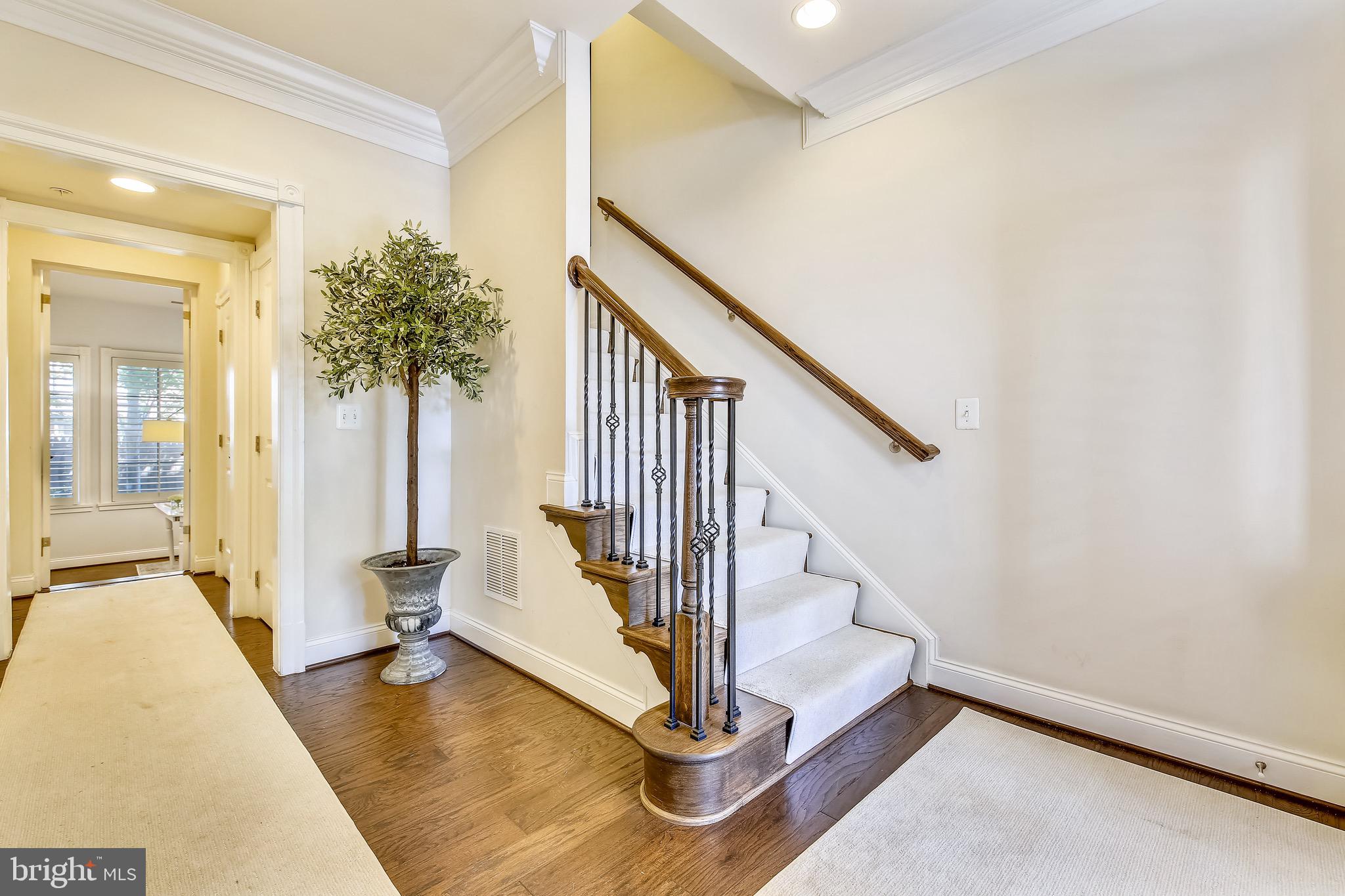 1411 Ridgeview Way Washington, DC 20007 - Photo 37 of 43 a view of entryway with wooden floor and stairs
