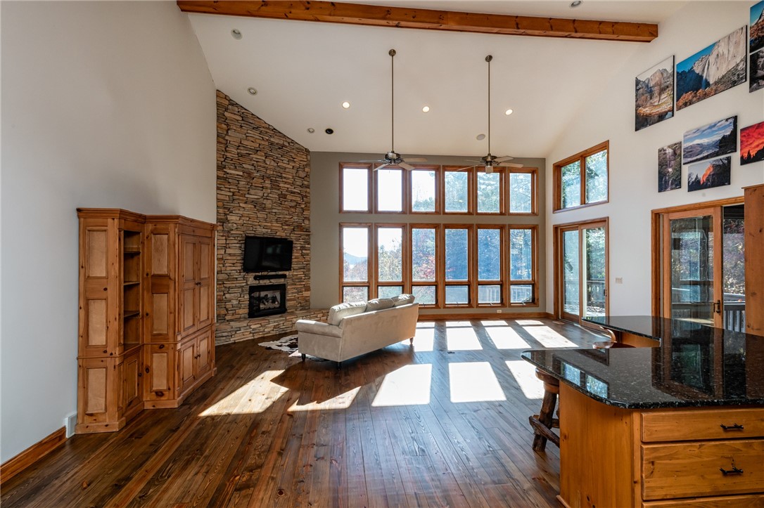 524 Ginseng Drive Sunset, SC 29685 - Photo 11 of 37 Great Room features stone fireplace, vaulted ceili
