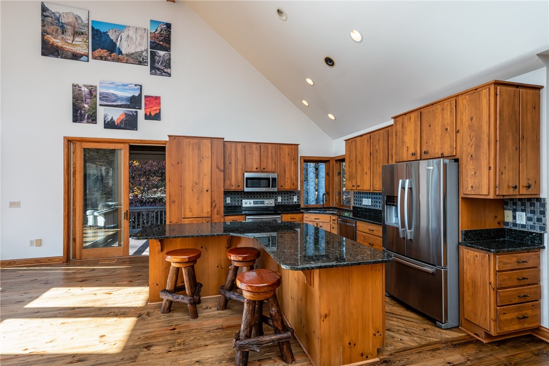 524 Ginseng Drive Sunset, SC 29685 - Photo 14 of 37 Kitchen opens to screened porch
