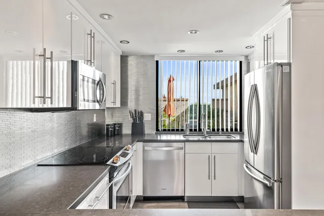 a bedroom with bed and window