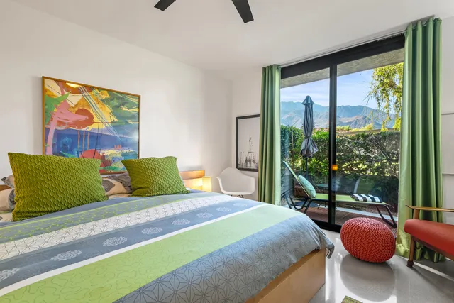a bathroom with a sink vanity mirror and toilet