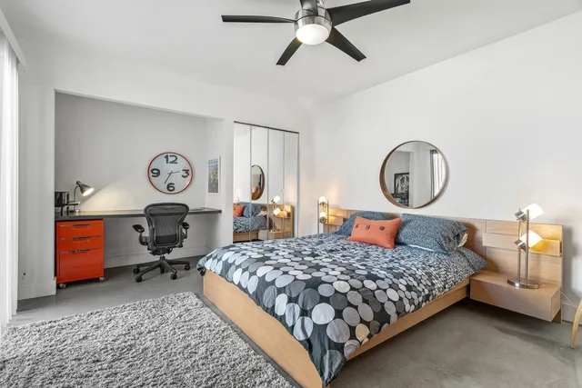 a front view of a house with a yard table and chairs
