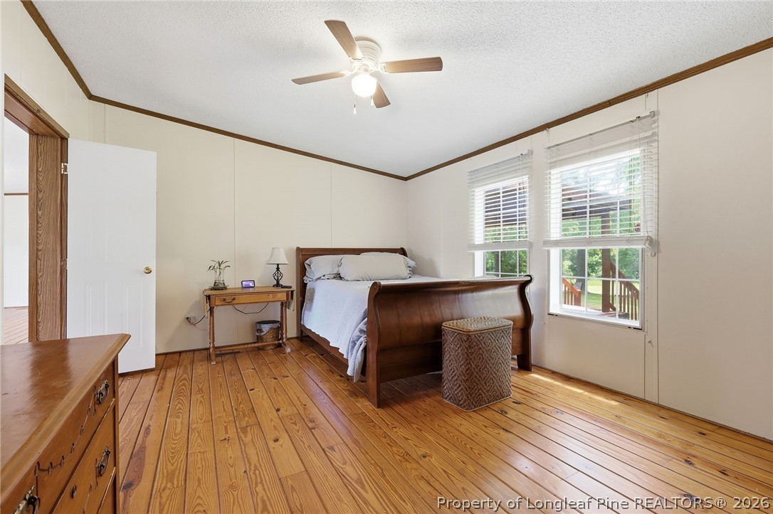10400 Ruth Vinson Road Autryville, NC 28318 - Photo 31 of 49 a bed room with a bed and a window