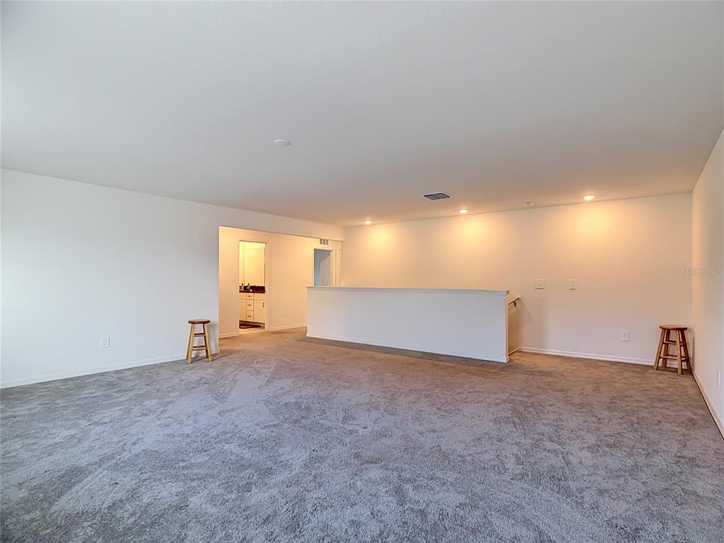 1633 Red Loop Lakeland, FL 33801 - Photo 28 of 60 a view of an empty room with a window