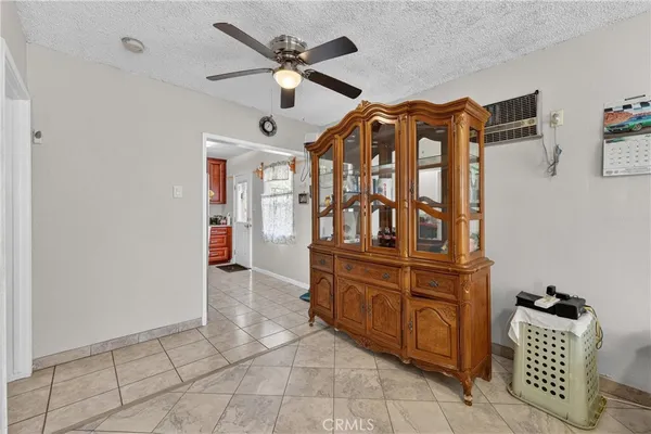 wooden floor with chandelier fan and wooden floor