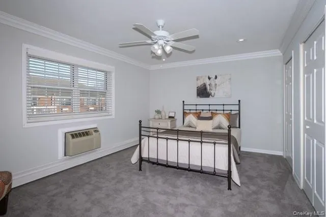 a bed room with a bed and a window