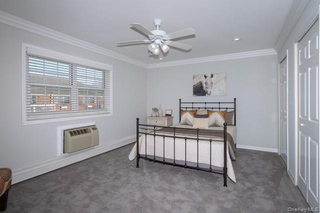 70 Middleton Road, Unit SF06 Bohemia, NY 11716 - Photo 7 of 11 a bed room with a bed and a window