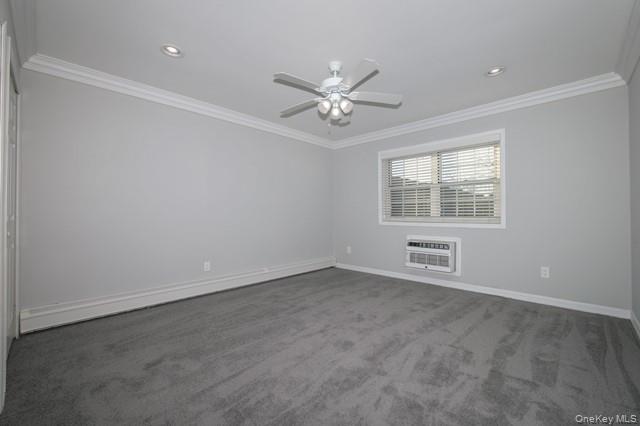 70 Middleton Road, Unit SF06 Bohemia, NY 11716 - Photo 9 of 11 an empty room with windows and fan