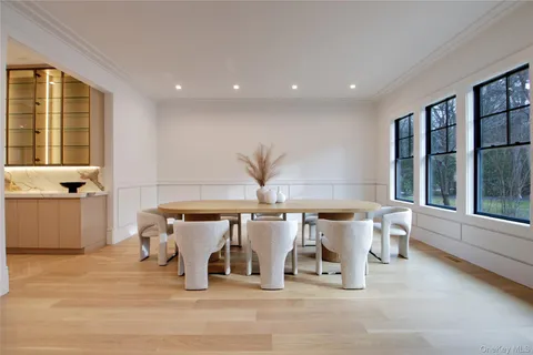a living room with lots of furniture and window