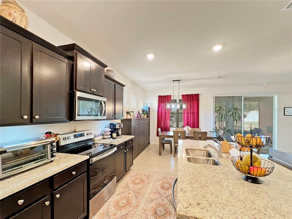 6265 Southwest 88th Loop Ocala, FL 34476 - Photo 32 of 42 a kitchen with lots of counter top space