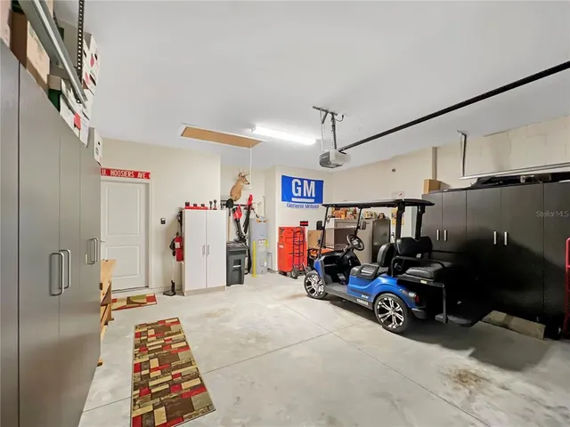 a view of a garage with rack and bicycle