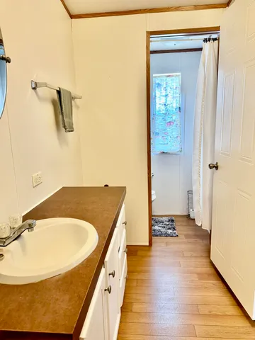 a bathroom with a sink and mirror